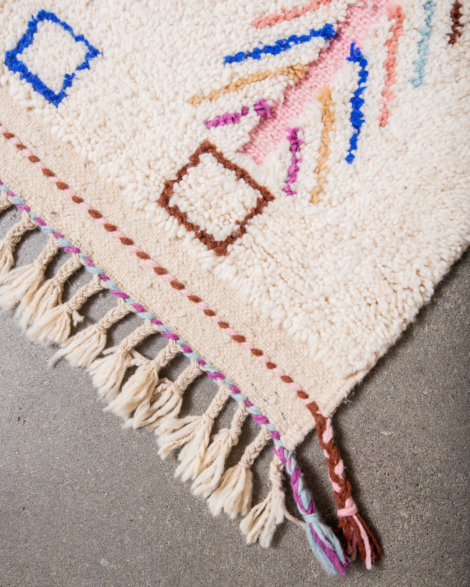 Modern, designer, handcrafted Berber rug from Morocco. Beniourain carpet with beautiful colours and patterns and fluffy wool texture.
